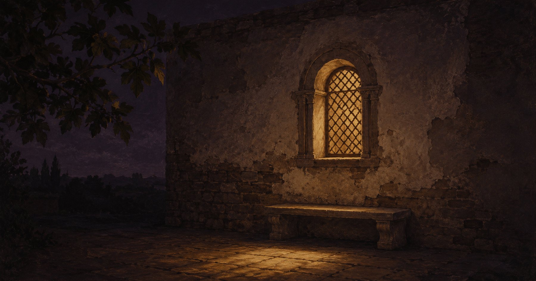 A lit arched window in a worn stone wall at night, seen from outside, with lamplight falling across an empty stone bench and the paving below